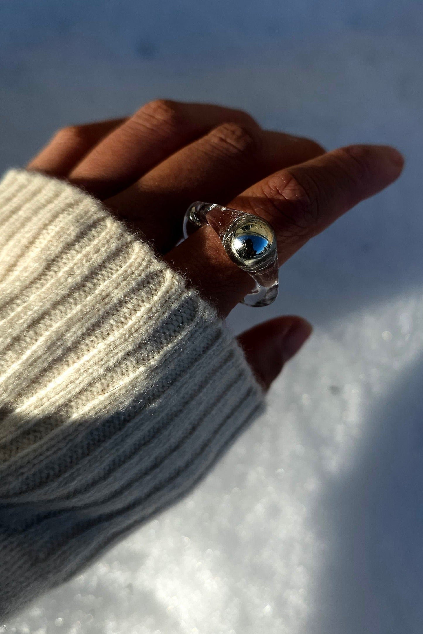 Model wearing MITSUKI silver ring, moonlit-inspired shimmering design for timeless elegance.