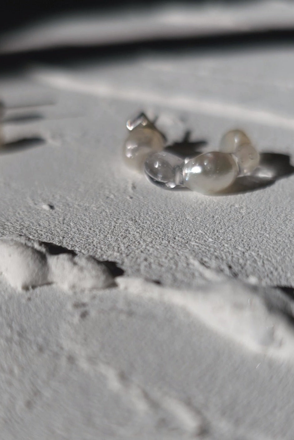Ibitsu Unique Freshwater Pearl Huggie Earrings laid 3