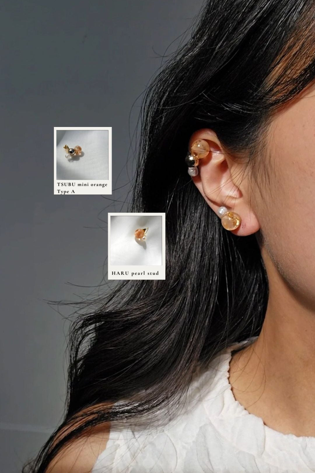 Model wearing TSUBU mini orange orb ear cuff on the helix with HARU orange pearl stud on the earlobe