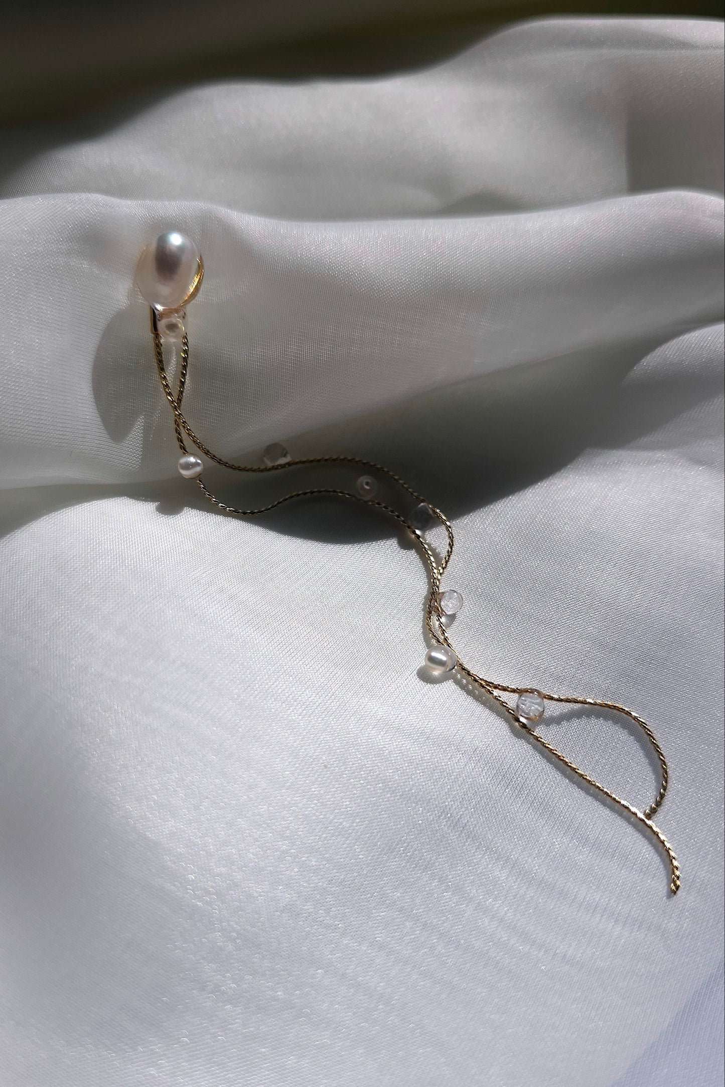 HISEN Aqua multiway drop earring with natural keshi pearls and clear elements, inspired by cascading waterfalls.
