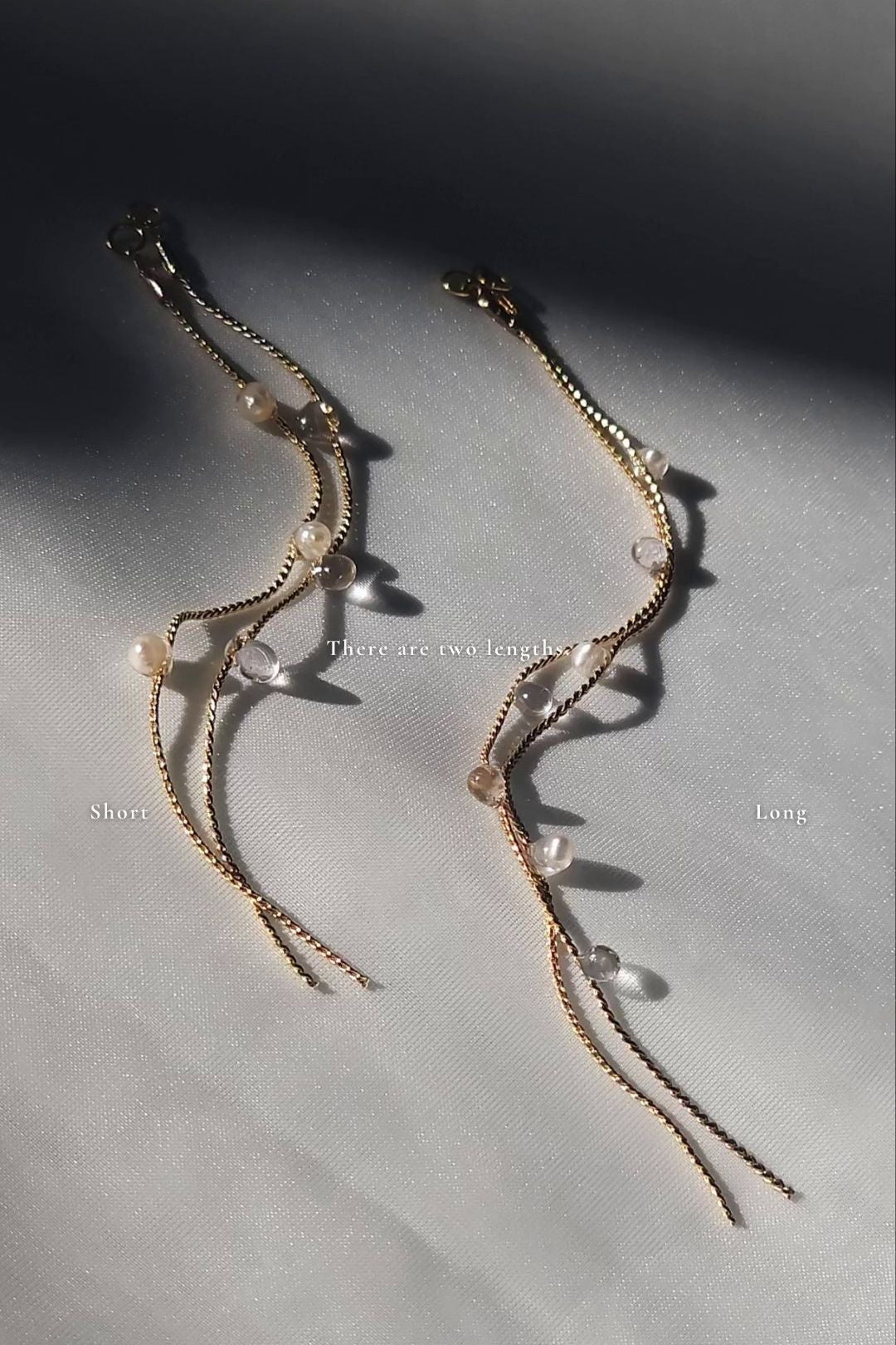 Delicate gold and pearl drop earring, HISEN aqua, in two different lengths.