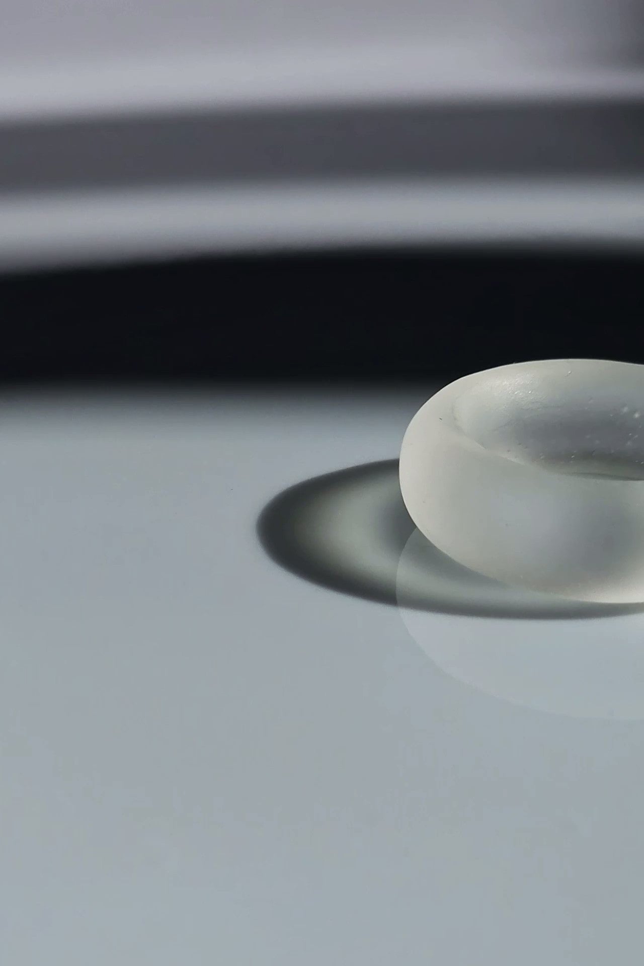 Close-up of KIRI ring showing frosty matte finish and calm, round silhouette.
