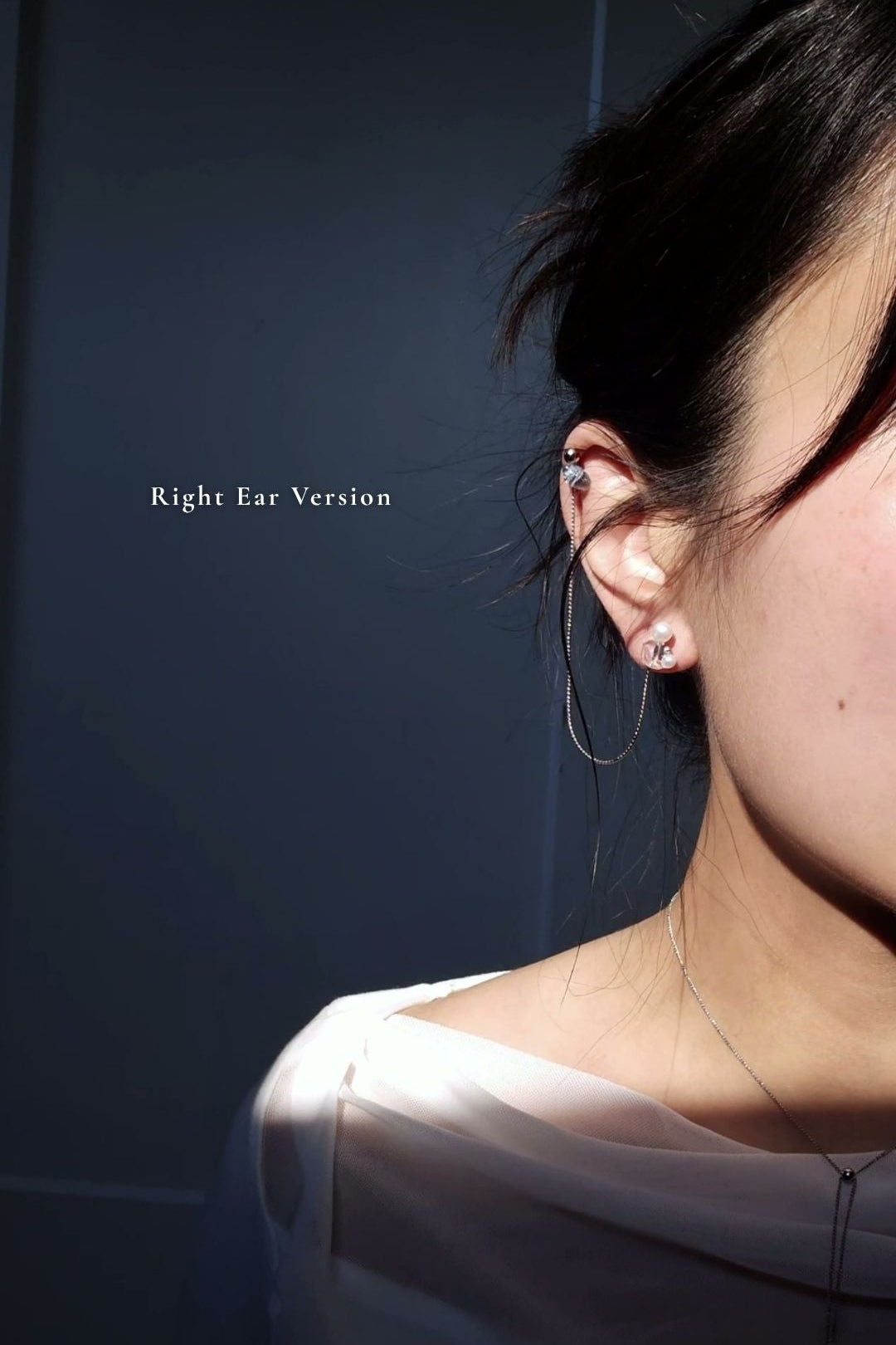 Model wearing mutliway cuff & stud, with the cuff part on helix and the stud part on earloben on a right ear.