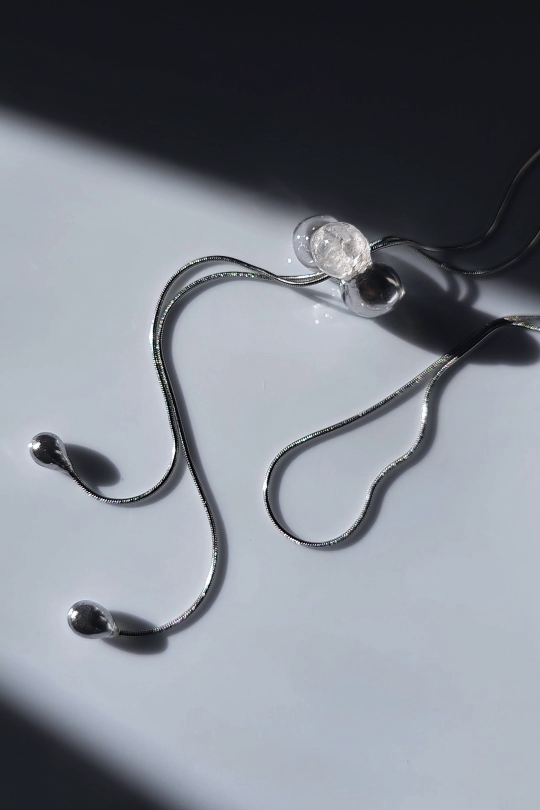 REI silver / tie necklace - triangle