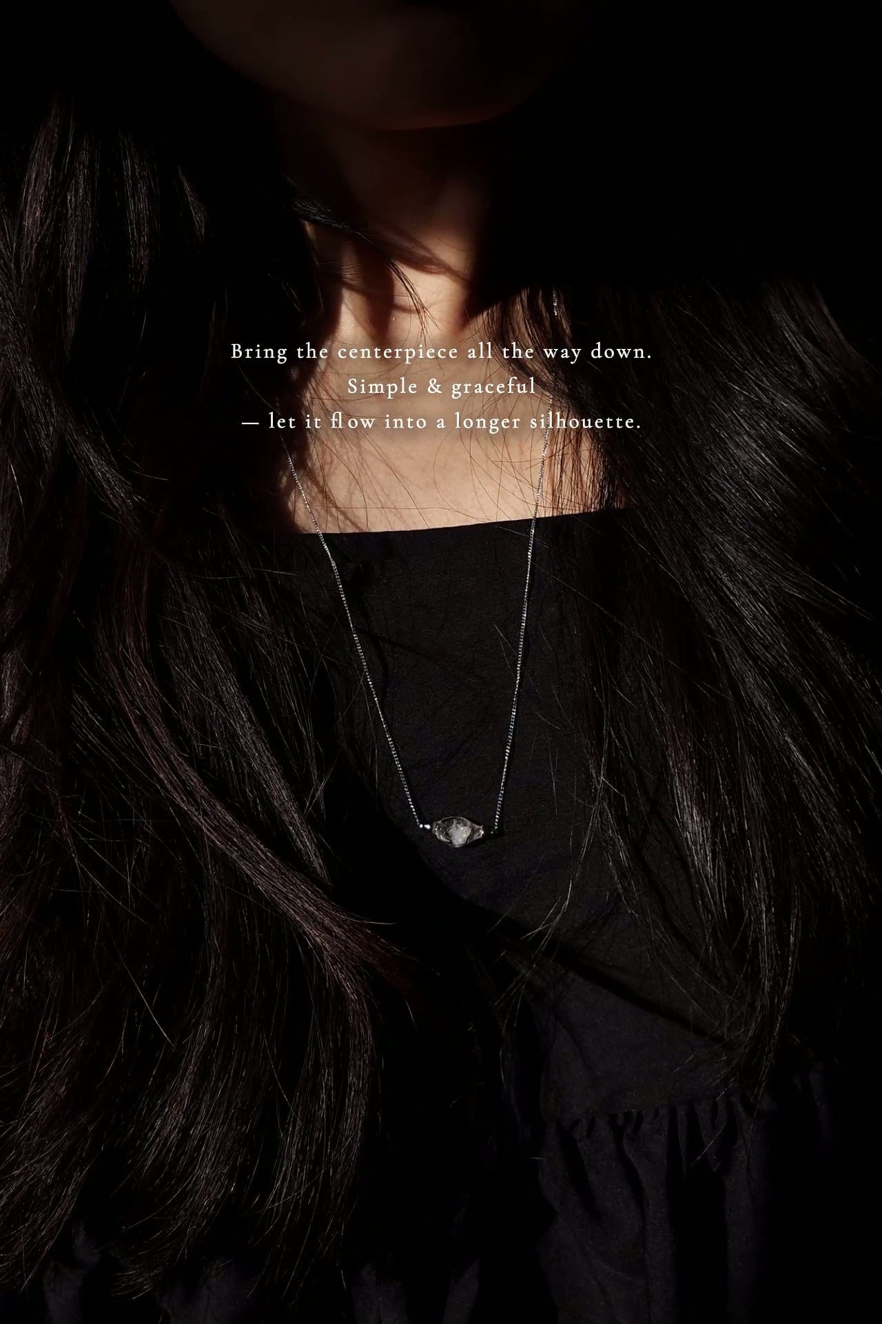 REI silver multiway necklace is worn on a model as a long necklace style