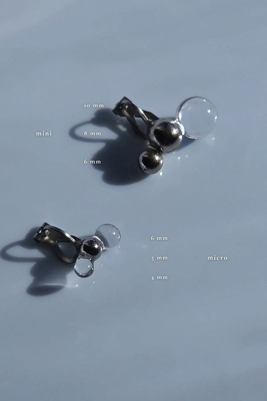 TSUBU micro fusion, tyny orb earcuff is compared with TSUBU mini fusion, the medium sized orb ear cuff.