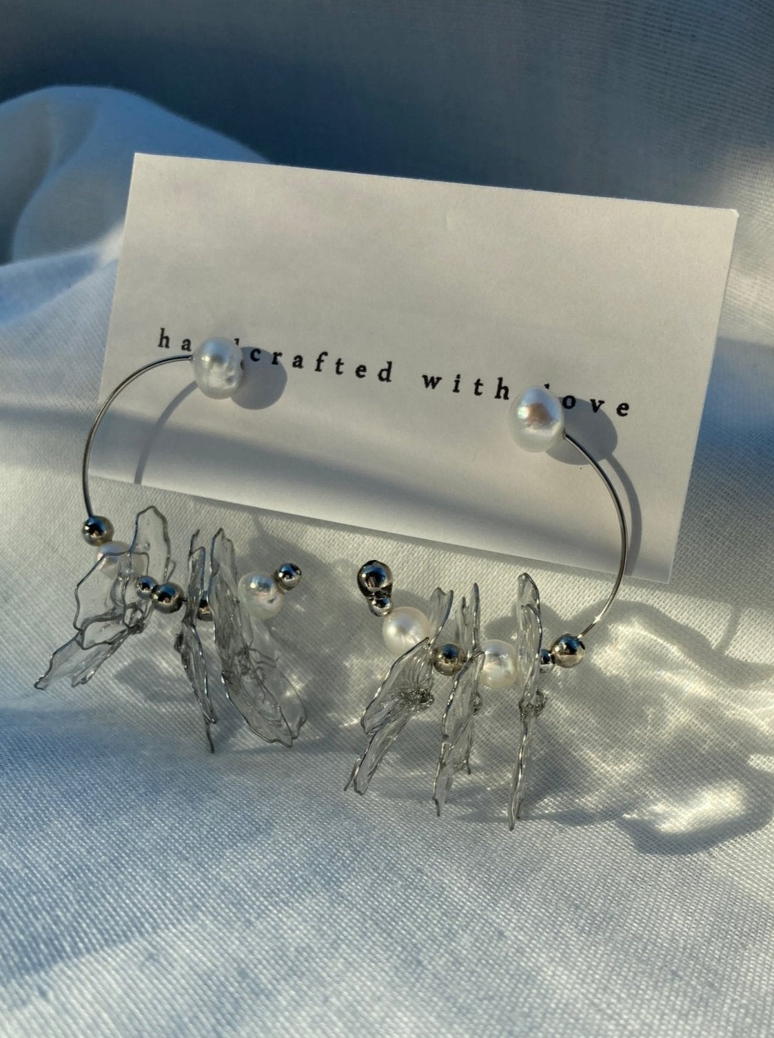 Rokka Clear Resin Petal & Freshwater Pearl Floral Earrings on Tag3