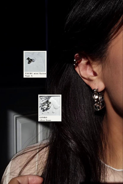 Close-up of a model wearing GINRO silver front earring with TSUBU mini fusion type A on the helix