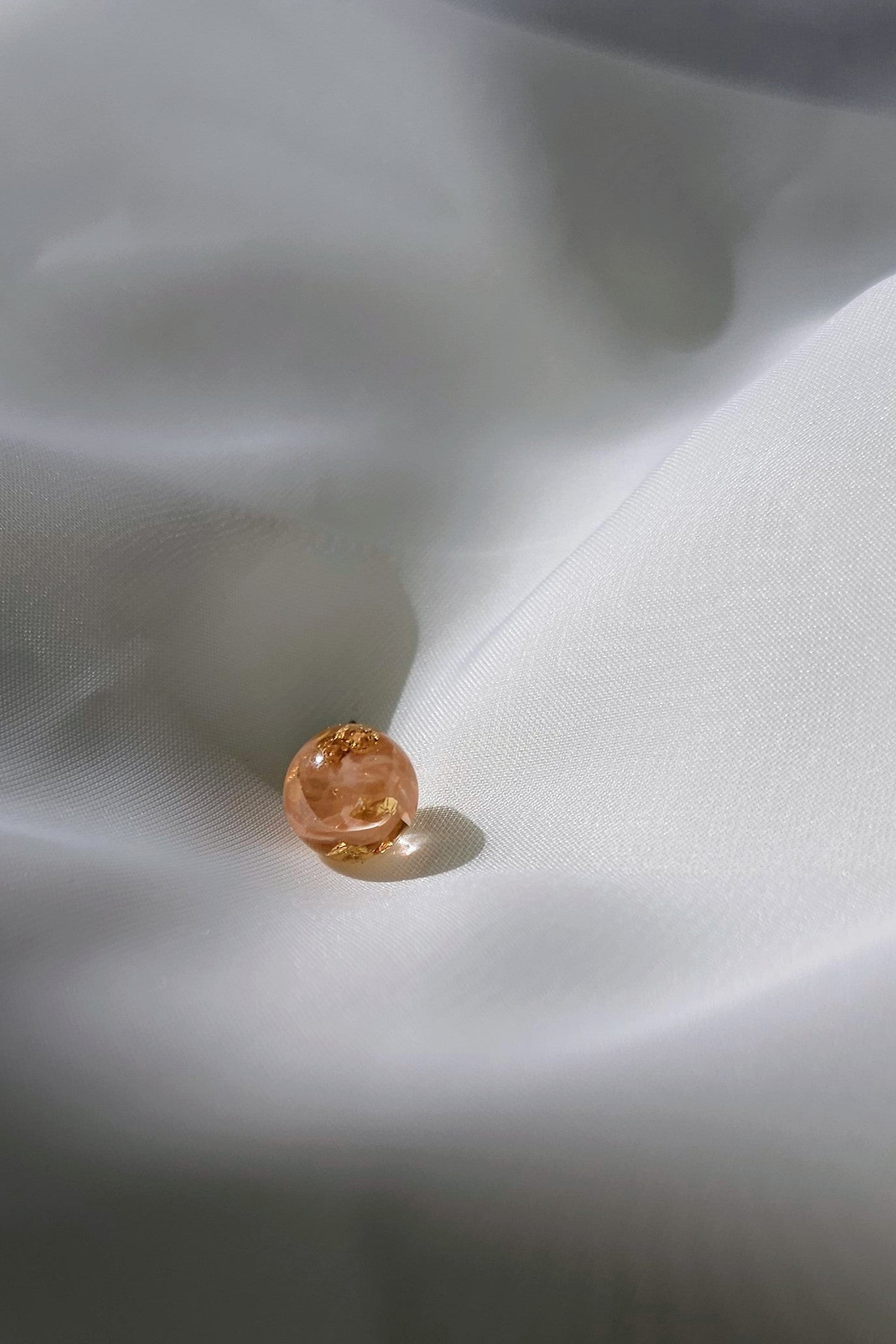 orange beige convertible earring stud only flatlay