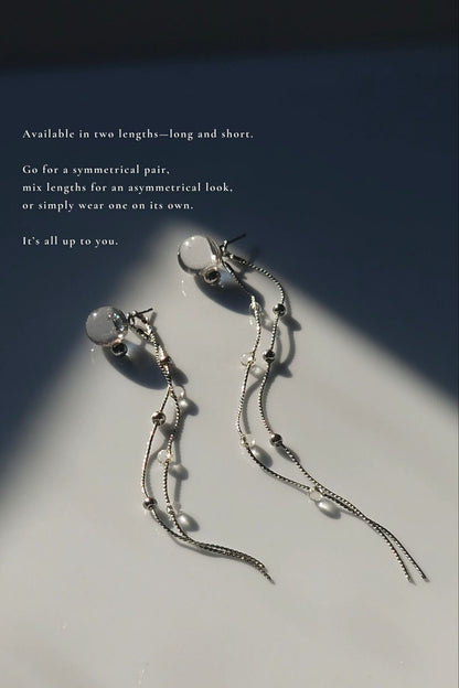 HISEN silver multiway drop earring with clear orb and silver chain strands, versatile as stud, drop, or dramatic style.