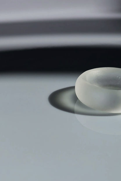 Close-up of KIRI ring showing frosty matte finish and calm, round silhouette.