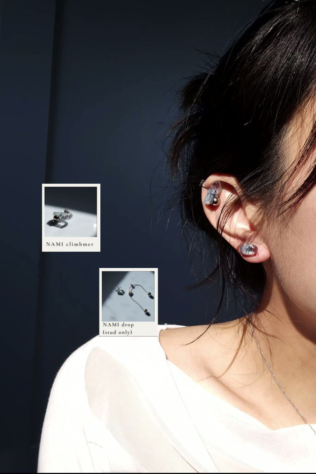 Model wearing NAMI ear climber on helix, paired with the stud part of NAMI multiway drop.