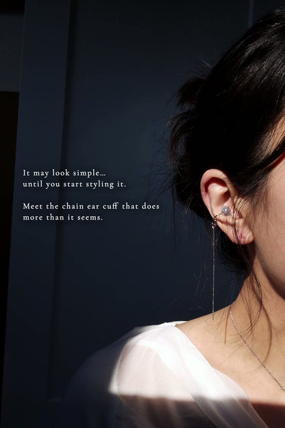 Model wearing NAMI multiway chain ear cuff on cartilage, featuring hand-blended silvery-blue stone and detachable chain.