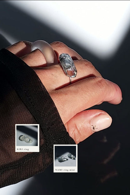 Model wearing NAMI ring mini, blue-grey ring and KIRI ring, misty ring.