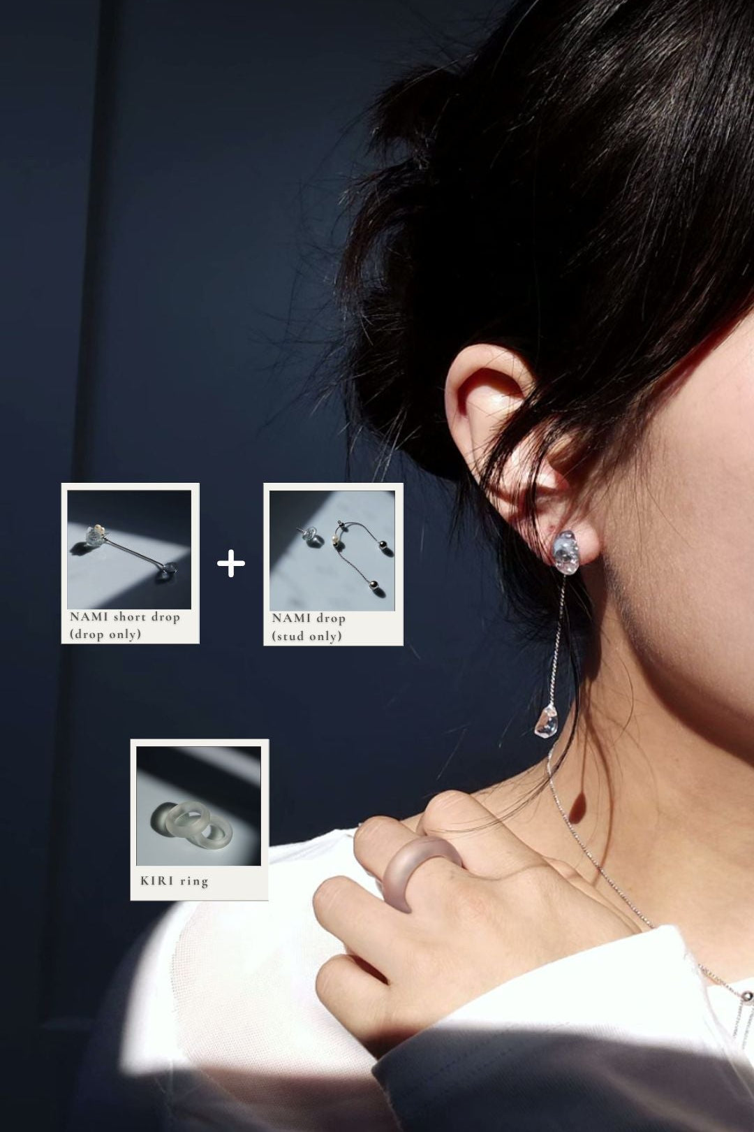 Person wearing NAMI multiway short drop, featuring a clear stone drop with silvery blue grey stone stud from NAMI multiway drop. KIRI frosty matte ring on the middle finger.
