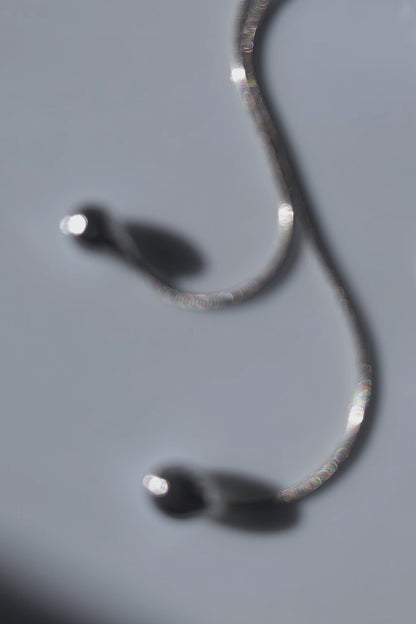 REI silver / tie necklace - triangle