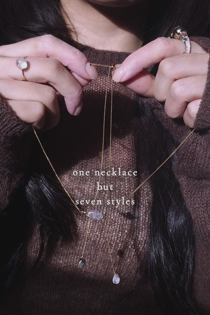 REI gold / sculpted necklace