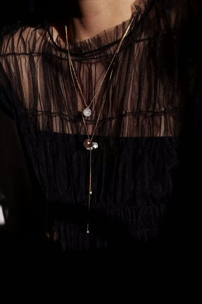 REI gold / multiway orb necklace