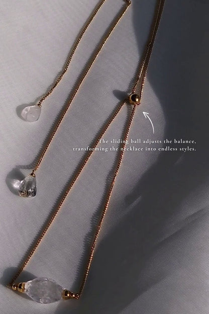 REI gold / sculpted necklace