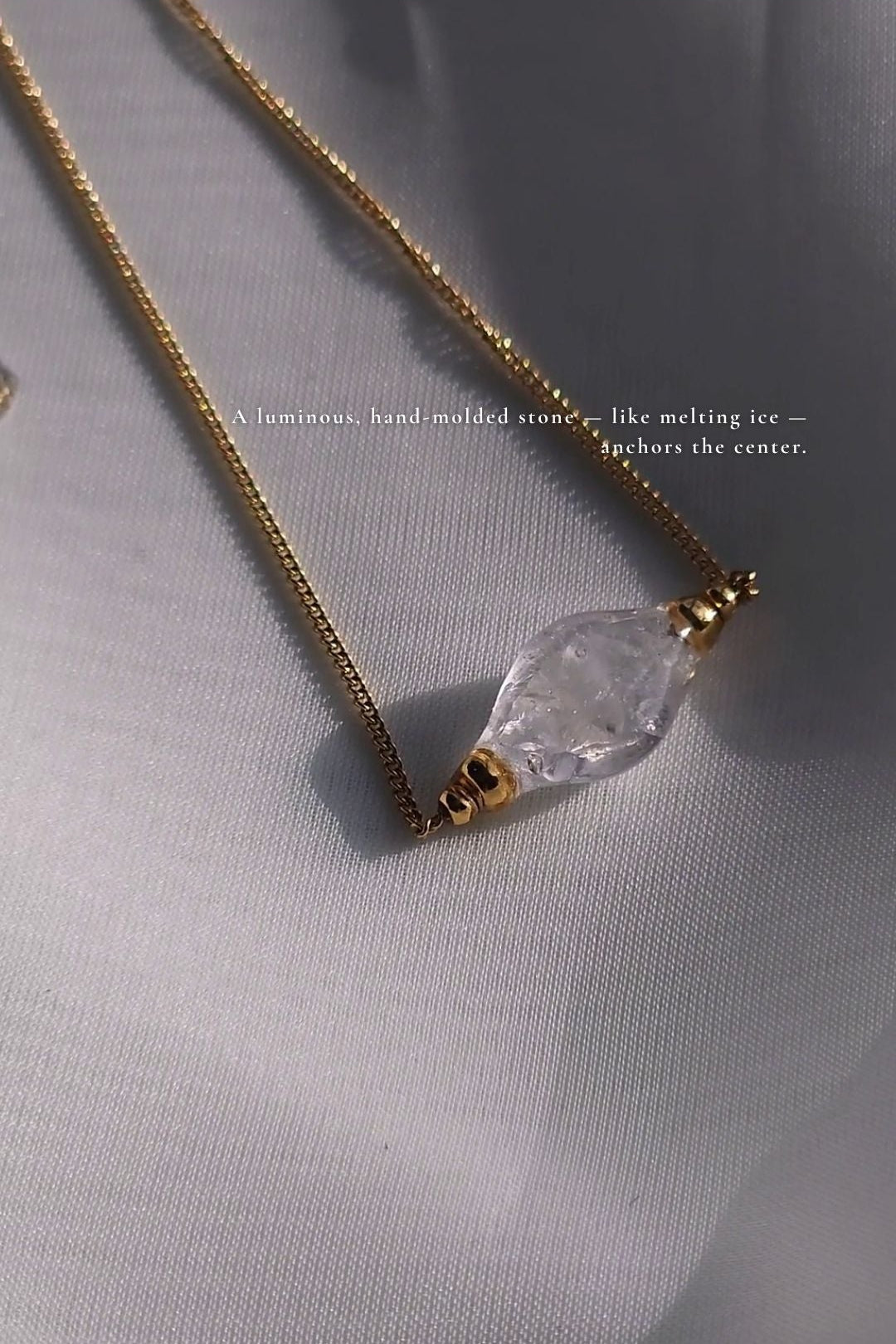 REI gold / sculpted necklace