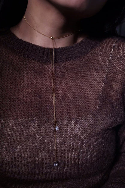 REI gold / sculpted necklace