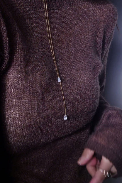 REI gold / sculpted necklace