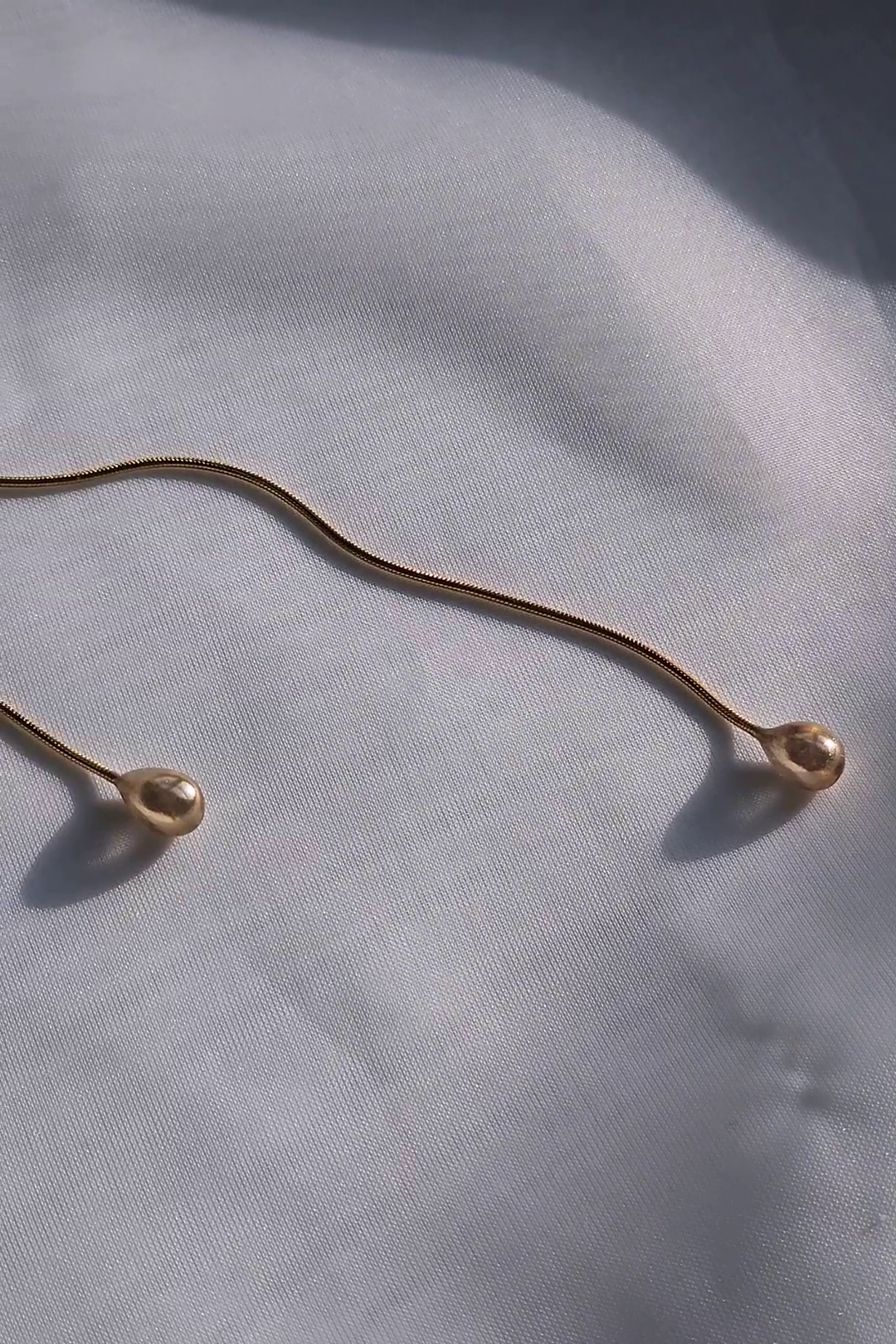 REI gold / tie necklace - flow