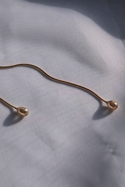 REI gold / tie necklace - flow