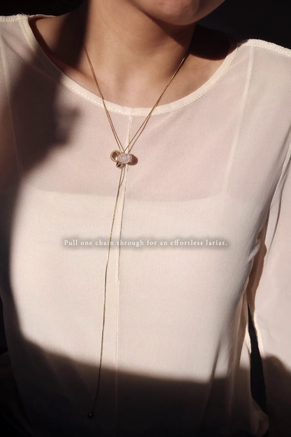 REI gold / tie necklace - triangle