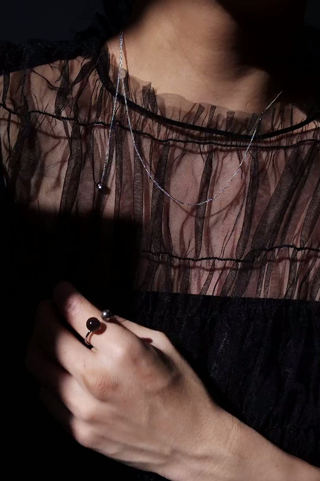 REI silver / orb necklace