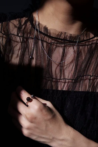 REI silver / orb necklace