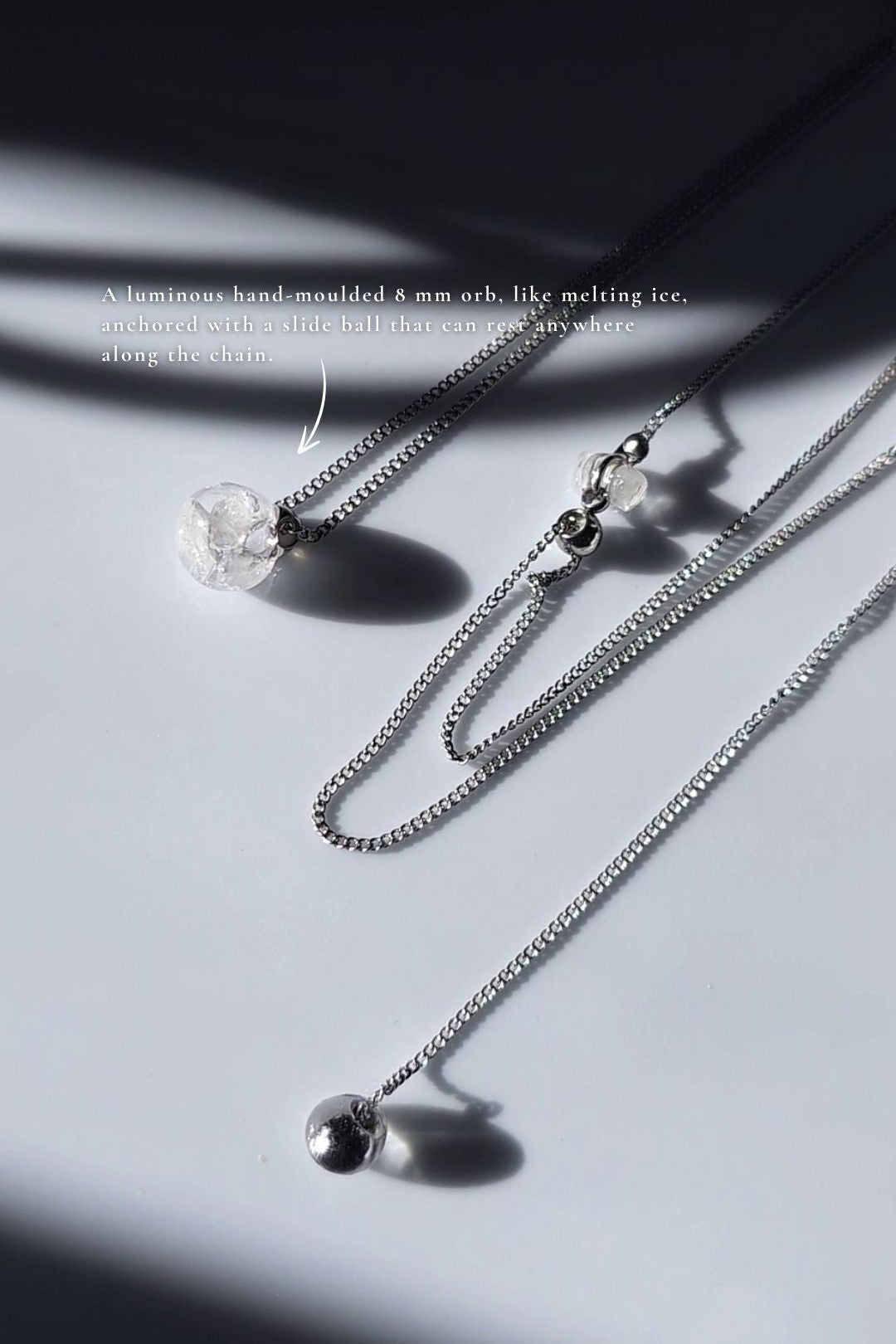 REI silver / multiway orb necklace