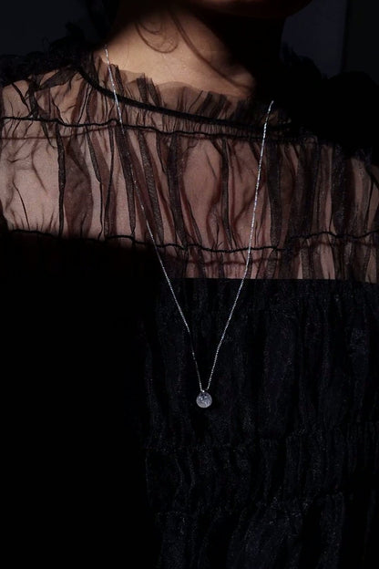 REI silver / orb necklace