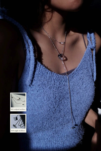 REI silver / sculpted necklace
