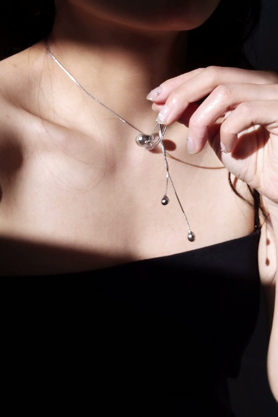 REI silver / tie necklace - triangle
