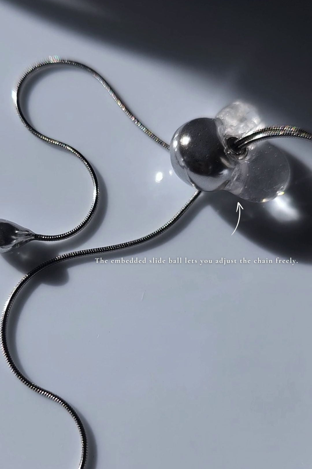 REI silver / tie necklace - triangle