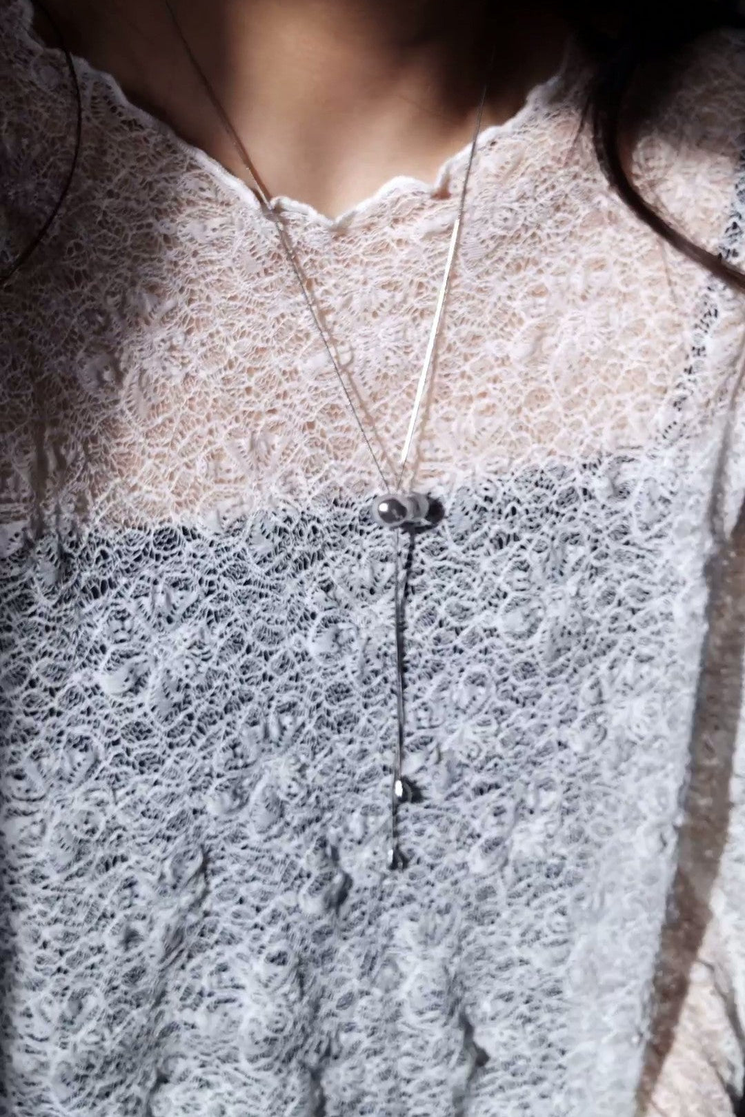 REI silver / tie necklace - triangle