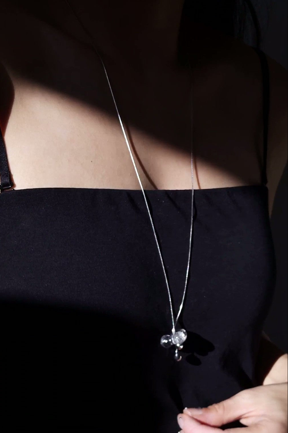 REI silver / tie necklace - triangle
