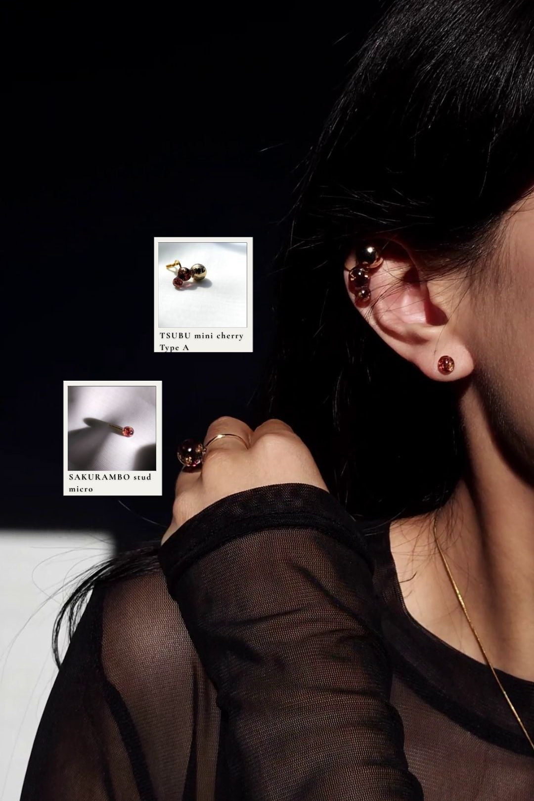 Close-up of a person wearing TSUBU mini cherry orb earcuff on the helix with a micro stud from SAKURAMBO dark cherry series