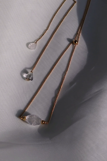 REI gold / sculpted necklace