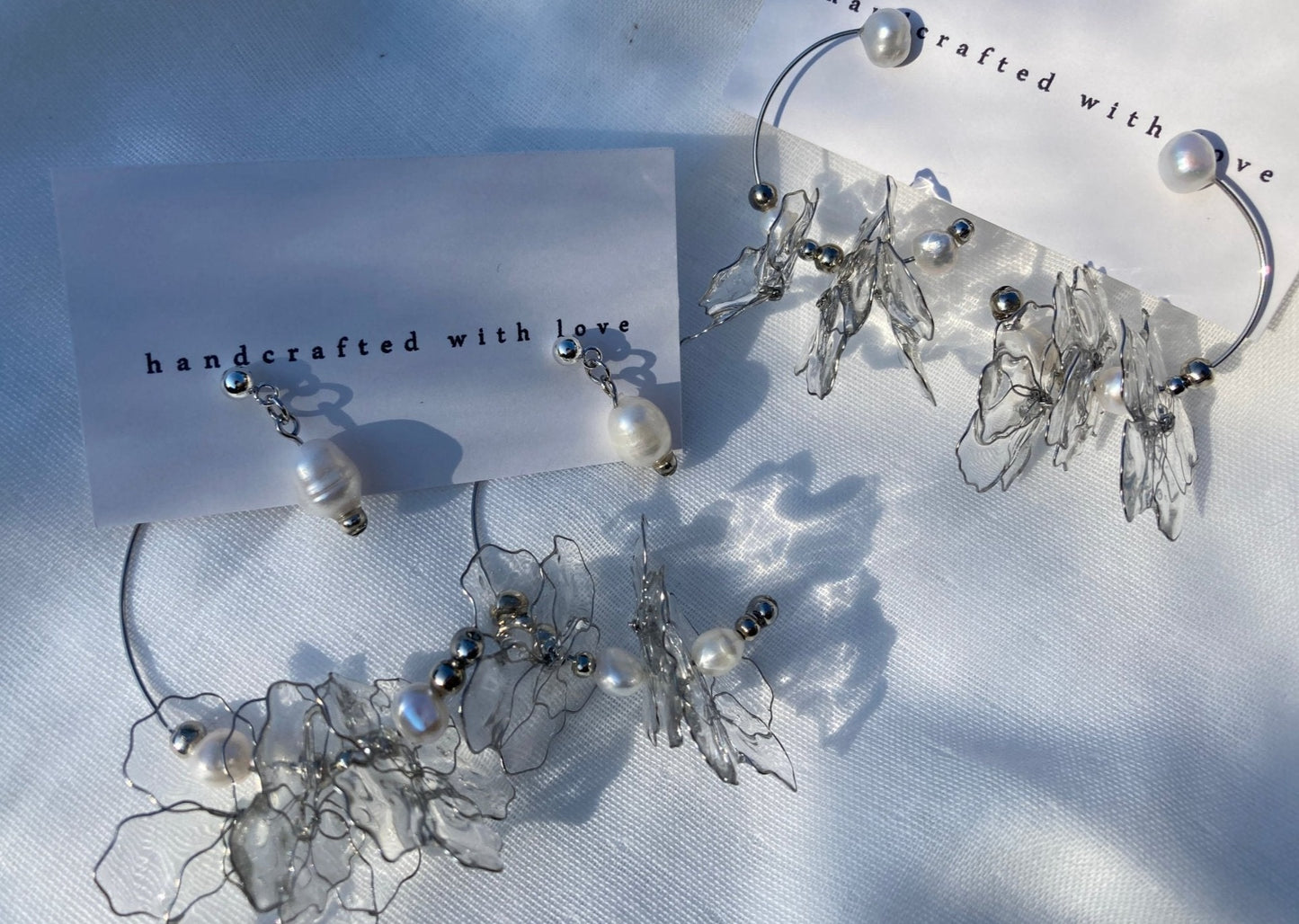 Ginka Clear Resin Petal & Freshwater Pearl Floral Earrings with Rokka