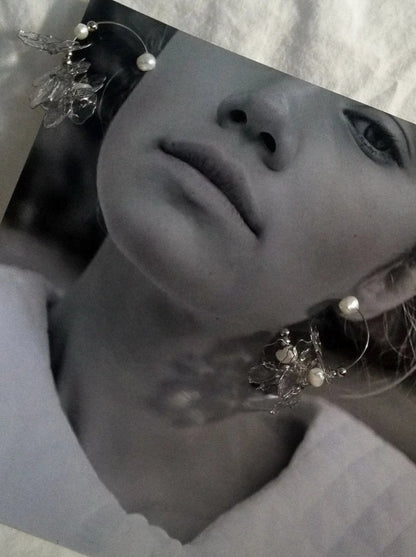 Rokka Clear Resin Petal & Freshwater Pearl Floral Earrings on Model1